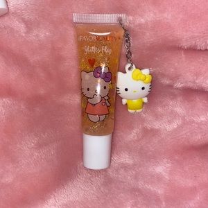 Hellokitty yellow glitter lipgloss with charm